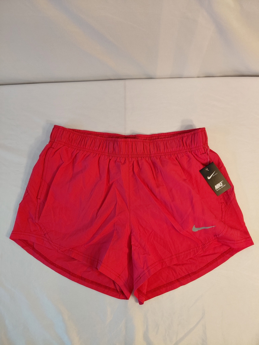Nike Women's Bright Pink Athletic Running Shorts with Reflective Swoosh
